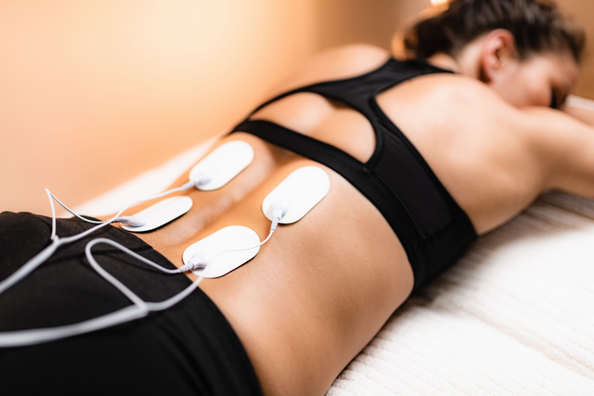 Lower Back Physical Therapy with TENS Electrode Pads, Transcutaneous Electrical Nerve Stimulation